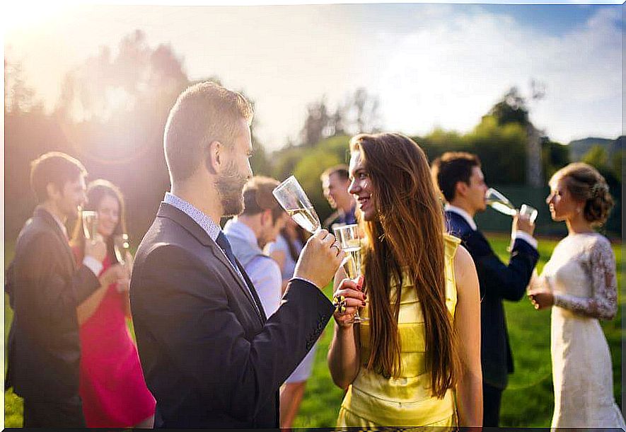 Wedding guests having a drink