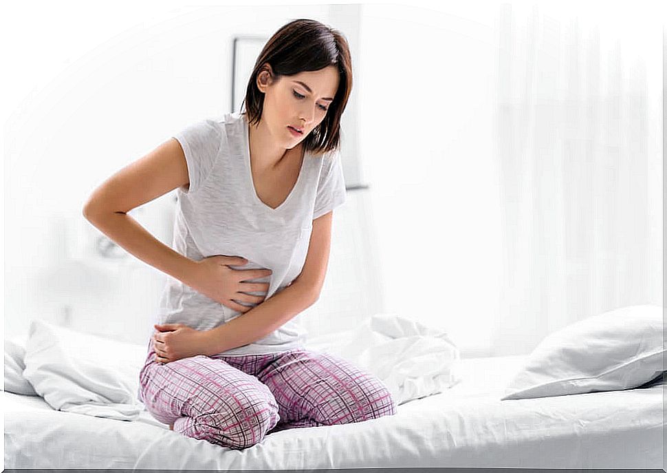 Woman with stomach pain from Helicobacter Pylori infection