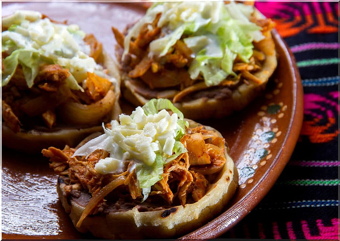 Mexican sopes in the foreground.